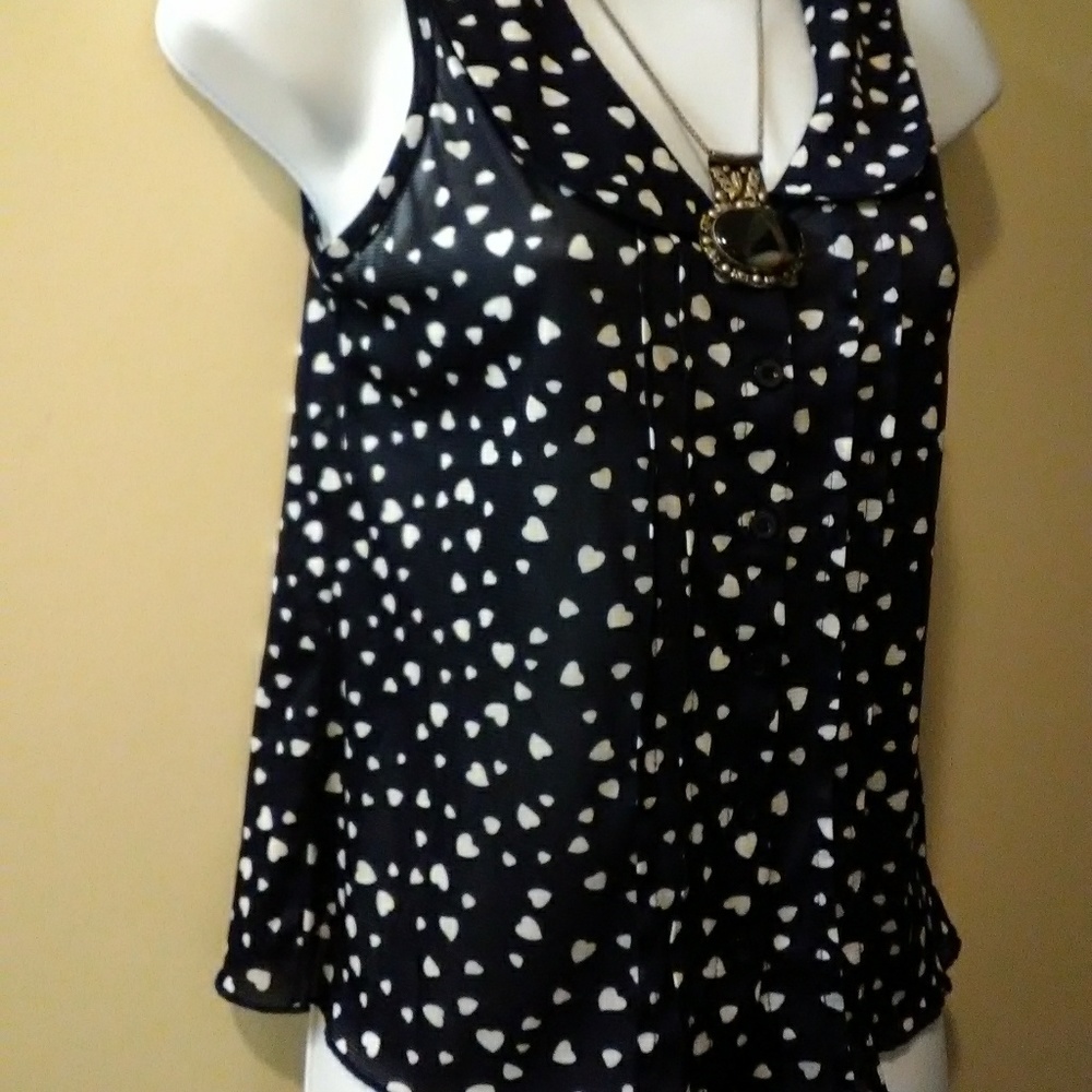Julie's closet black with white hearts top. Size S